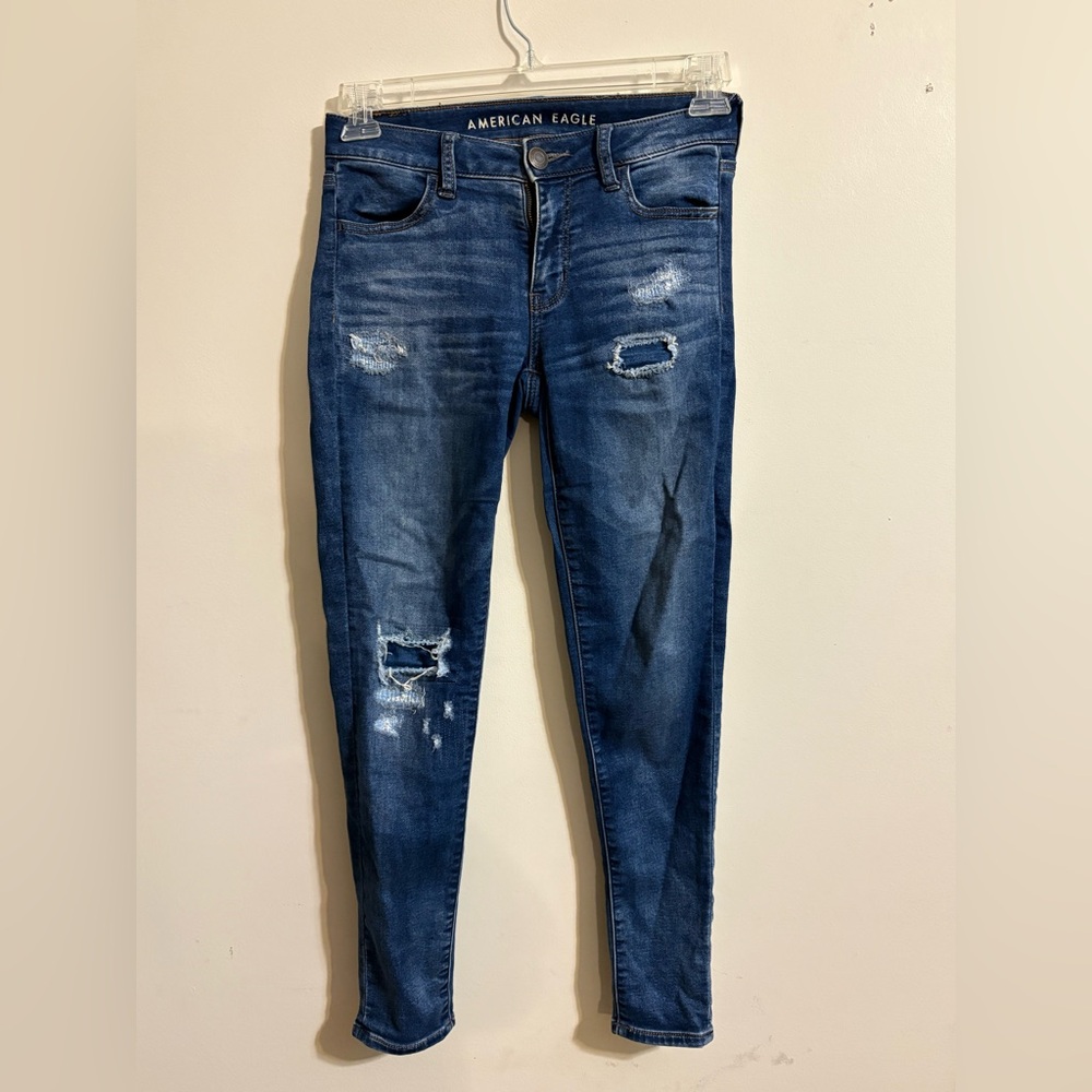 American Eagle Outfitters Women’s SZ 4 blue jeans distressed skinny fit jeggings